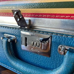 Rare “Cosmetic” Blue Ventura vintage suitcase.